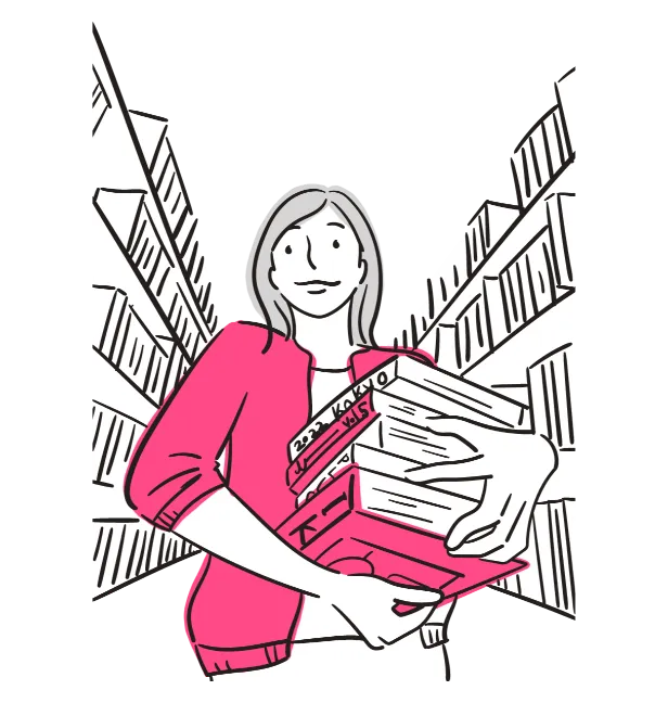 資料を抱える女性